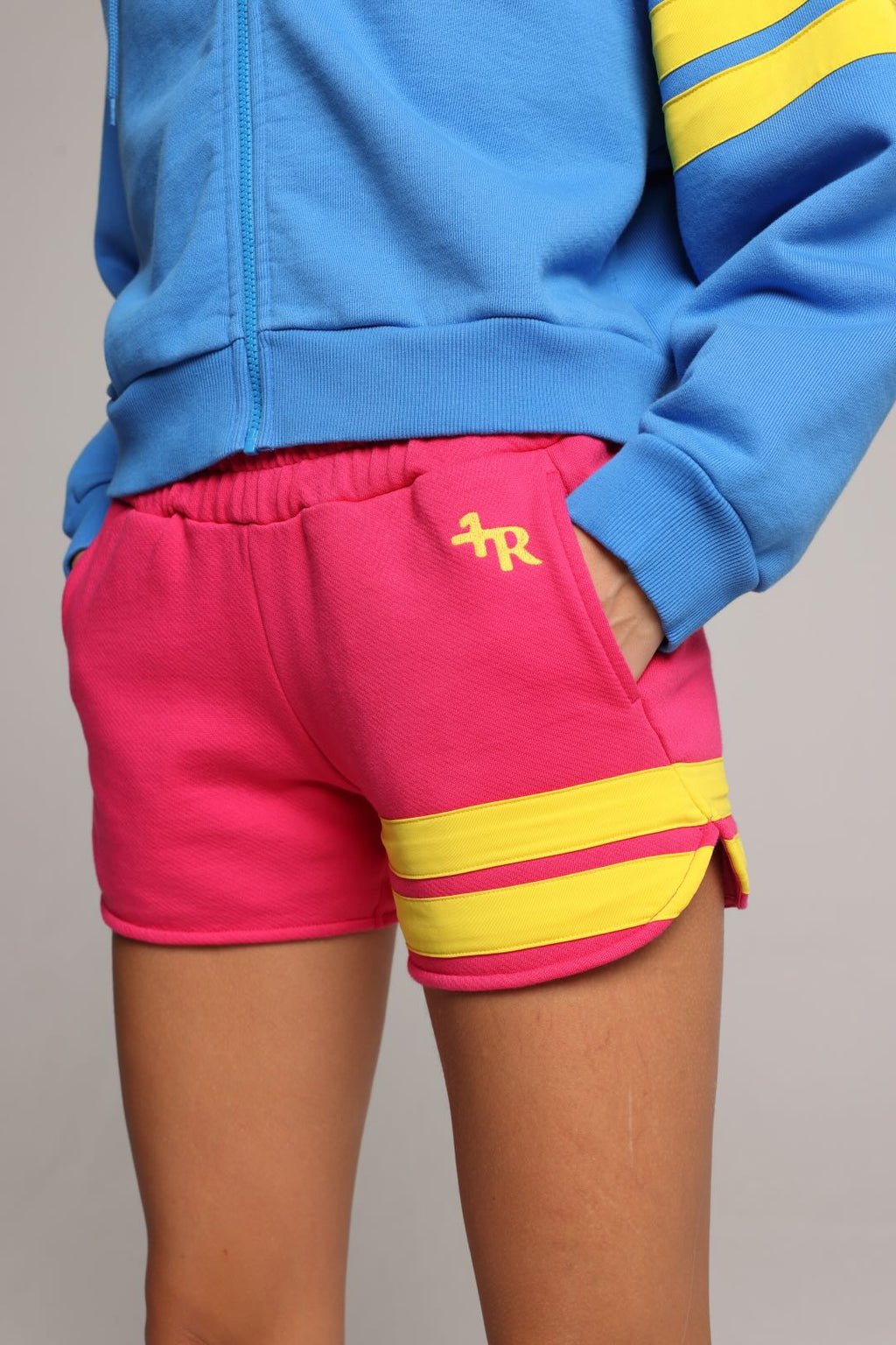 pink cotton shorts with yellow stripes and a blue hoodie by one more reason premium sportswear studio set