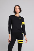 women in black long sleeve performance top and black leggings with yellow stripes top premium luxury activewear by One More Reason high-performance fitness apparel